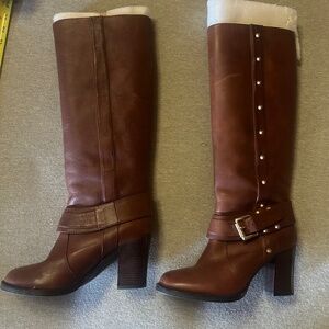 Tall brown leather boots